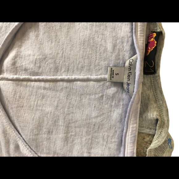 5 Mix matched tank tops. Sizes extra small to small and one medium - Picture 9 of 11